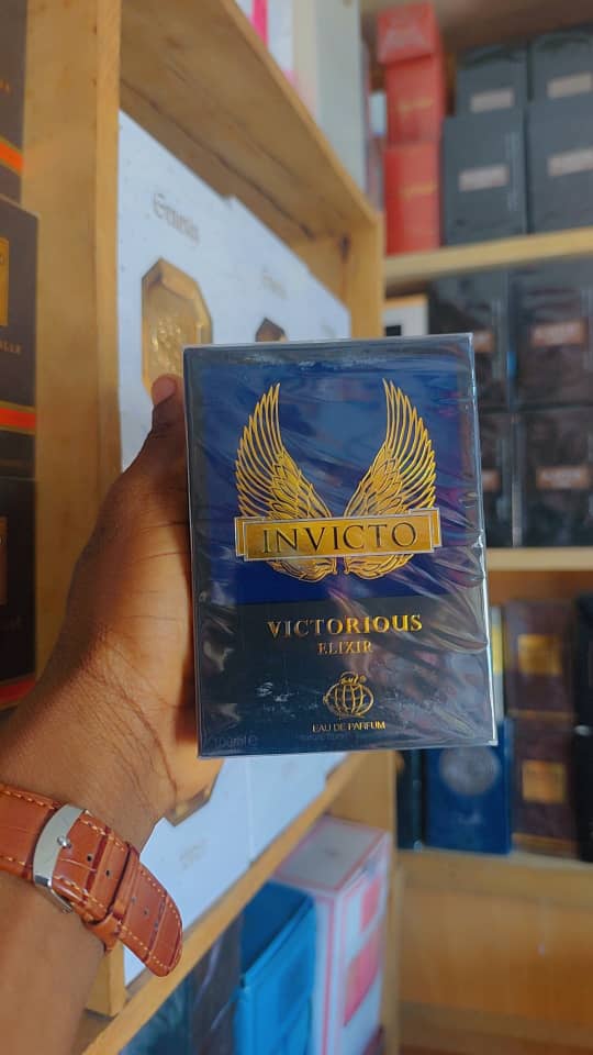 Fragrance World Invicto Victorious Elixir — flacon réel en stock